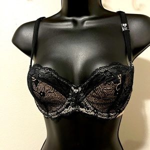 BLACKHEART bra new with partial tags.  Black and nude color. Underwire. 36B